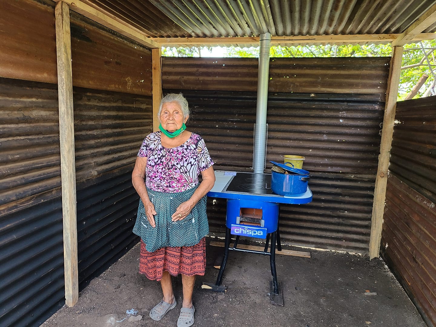 Guatemalan woman with Chispa cook stove